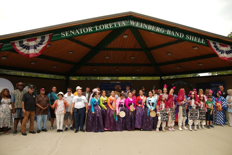 Performers, partners and community members gather for a group photo at the 7th Annual Peace Festival